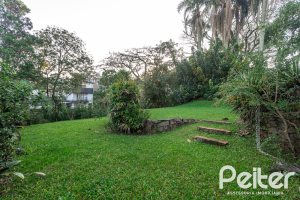 Casa em Condomínio à venda com 363m², 3 dormitórios, 2 suítes, 4 vagas, no bairro Cavalhada em PORTO ALEGRE
