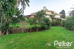 Casa em Condomínio à venda com 363m², 3 dormitórios, 2 suítes, 4 vagas, no bairro Cavalhada em PORTO ALEGRE