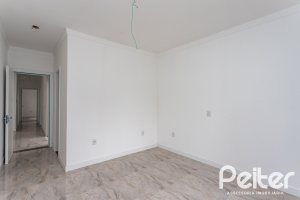 Casa em Condomínio à venda com 90m², 3 dormitórios, 1 suíte, 2 vagas, no bairro Aberta dos Morros em Porto Alegre