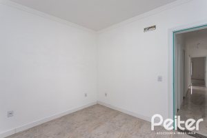 Casa em Condomínio à venda com 90m², 3 dormitórios, 1 suíte, 2 vagas, no bairro Aberta dos Morros em Porto Alegre