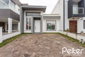 Casa em Condomínio à venda com 90m², 3 dormitórios, 1 suíte, 2 vagas, no bairro Aberta dos Morros em Porto Alegre