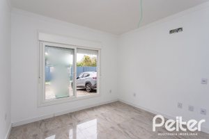 Casa em Condomínio à venda com 90m², 3 dormitórios, 1 suíte, 2 vagas, no bairro Aberta dos Morros em Porto Alegre