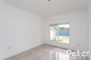 Casa em Condomínio à venda com 90m², 3 dormitórios, 1 suíte, 2 vagas, no bairro Aberta dos Morros em Porto Alegre