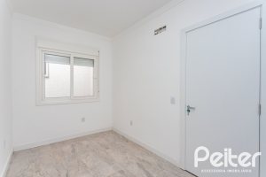 Casa em Condomínio à venda com 90m², 3 dormitórios, 1 suíte, 2 vagas, no bairro Aberta dos Morros em Porto Alegre