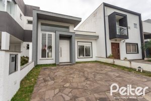 Casa em Condomínio à venda com 90m², 3 dormitórios, 1 suíte, 2 vagas, no bairro Aberta dos Morros em Porto Alegre