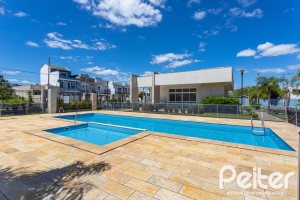 Casa em Condomínio à venda com 90m², 3 dormitórios, 1 suíte, 2 vagas, no bairro Aberta dos Morros em Porto Alegre