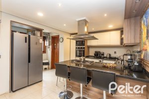 Apartamento à venda com 129m², 4 dormitórios, 1 suíte, 2 vagas, no bairro Ipanema em Porto Alegre
