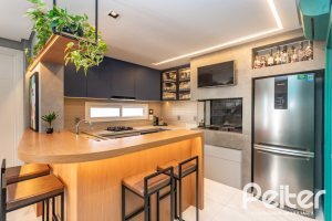 Casa em Condomínio à venda com 154m², 3 dormitórios, 3 suítes, 2 vagas, no bairro Vila Assunção em Porto Alegre