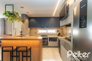 Casa em Condomínio à venda com 154m², 3 dormitórios, 3 suítes, 2 vagas, no bairro Vila Assunção em Porto Alegre