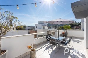 Casa em Condomínio à venda com 154m², 3 dormitórios, 3 suítes, 2 vagas, no bairro Vila Assunção em Porto Alegre