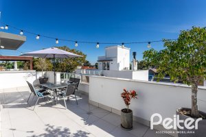 Casa em Condomínio à venda com 154m², 3 dormitórios, 3 suítes, 2 vagas, no bairro Vila Assunção em Porto Alegre