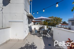 Casa em Condomínio à venda com 154m², 3 dormitórios, 3 suítes, 2 vagas, no bairro Vila Assunção em Porto Alegre
