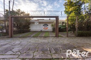 Casa em Condomínio à venda com 323m², 5 dormitórios, 1 suíte, 4 vagas, no bairro Tristeza em Porto Alegre