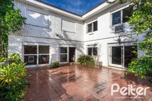 Casa em Condomínio à venda com 323m², 5 dormitórios, 1 suíte, 4 vagas, no bairro Tristeza em Porto Alegre