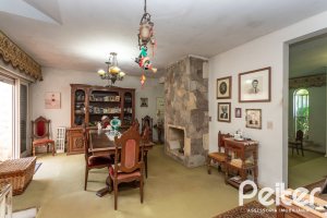 Casa em Condomínio à venda com 323m², 5 dormitórios, 1 suíte, 4 vagas, no bairro Tristeza em Porto Alegre