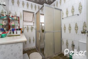 Casa em Condomínio à venda com 323m², 5 dormitórios, 1 suíte, 4 vagas, no bairro Tristeza em Porto Alegre