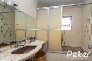 Casa em Condomínio à venda com 323m², 5 dormitórios, 1 suíte, 4 vagas, no bairro Tristeza em Porto Alegre
