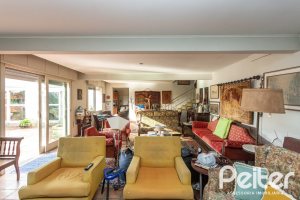 Casa em Condomínio à venda com 323m², 5 dormitórios, 1 suíte, 4 vagas, no bairro Tristeza em Porto Alegre