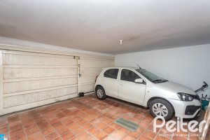 Casa em Condomínio à venda com 323m², 5 dormitórios, 1 suíte, 4 vagas, no bairro Tristeza em Porto Alegre
