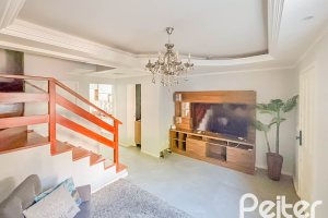 Casa em Condomínio à venda com 117m², 3 dormitórios, 1 suíte, 2 vagas, no bairro Vila Nova em PORTO ALEGRE