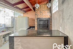 Casa em Condomínio à venda com 117m², 3 dormitórios, 1 suíte, 2 vagas, no bairro Vila Nova em PORTO ALEGRE