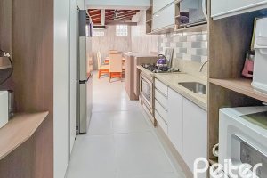 Casa em Condomínio à venda com 117m², 3 dormitórios, 1 suíte, 2 vagas, no bairro Vila Nova em PORTO ALEGRE