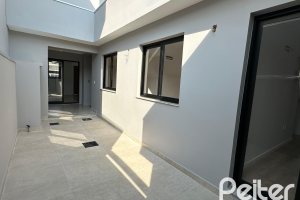 Casa em Condomínio à venda com 95m², 3 dormitórios, 1 suíte, 1 vaga, no bairro Hípica em Porto Alegre