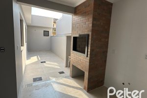 Casa em Condomínio à venda com 95m², 3 dormitórios, 1 suíte, 1 vaga, no bairro Hípica em Porto Alegre