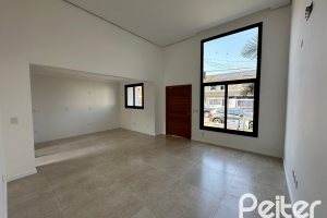 Casa em Condomínio à venda com 95m², 3 dormitórios, 1 suíte, 1 vaga, no bairro Hípica em Porto Alegre