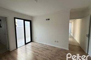 Casa em Condomínio à venda com 95m², 3 dormitórios, 1 suíte, 1 vaga, no bairro Hípica em Porto Alegre