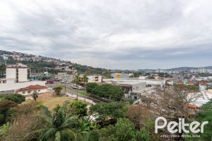 Apartamento à venda com 65m², 2 dormitórios, 1 suíte, 1 vaga, no bairro Cristal em PORTO ALEGRE