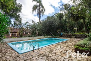 Casa em Condomínio à venda com 250m², 3 dormitórios, 1 suíte, 2 vagas, no bairro Ipanema em Porto Alegre