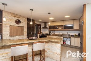 Casa em Condomínio à venda com 257m², 4 dormitórios, 4 suítes, 3 vagas, no bairro Tristeza em Porto Alegre