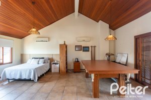 Casa em Condomínio à venda com 257m², 4 dormitórios, 4 suítes, 3 vagas, no bairro Tristeza em Porto Alegre