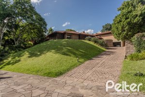 Casa em Condomínio à venda com 900m², 5 dormitórios, 5 suítes, 10 vagas, no bairro Cavalhada em PORTO ALEGRE
