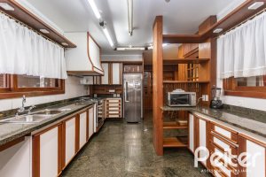 Casa em Condomínio à venda com 900m², 5 dormitórios, 5 suítes, 10 vagas, no bairro Cavalhada em PORTO ALEGRE