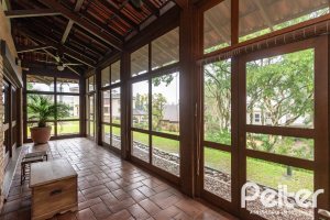 Casa em Condomínio à venda com 900m², 5 dormitórios, 5 suítes, 10 vagas, no bairro Cavalhada em PORTO ALEGRE