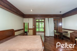 Casa em Condomínio à venda com 900m², 5 dormitórios, 5 suítes, 10 vagas, no bairro Cavalhada em PORTO ALEGRE