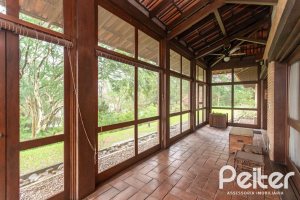 Casa em Condomínio à venda com 900m², 5 dormitórios, 5 suítes, 10 vagas, no bairro Cavalhada em PORTO ALEGRE