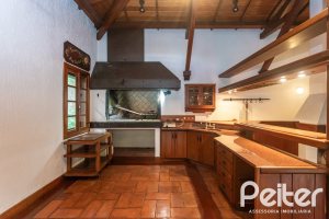 Casa em Condomínio à venda com 900m², 5 dormitórios, 5 suítes, 10 vagas, no bairro Cavalhada em PORTO ALEGRE