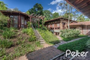 Casa em Condomínio à venda com 900m², 5 dormitórios, 5 suítes, 10 vagas, no bairro Cavalhada em PORTO ALEGRE