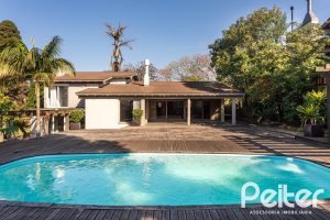 Casa em Condomínio à venda com 328m², 3 dormitórios, 2 suítes, 4 vagas, no bairro Cavalhada em PORTO ALEGRE