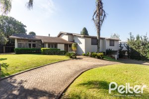 Casa em Condomínio à venda com 328m², 3 dormitórios, 2 suítes, 4 vagas, no bairro Cavalhada em PORTO ALEGRE