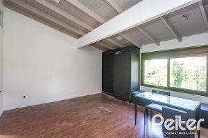 Casa em Condomínio à venda com 328m², 3 dormitórios, 2 suítes, 4 vagas, no bairro Cavalhada em PORTO ALEGRE
