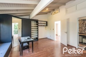 Casa em Condomínio à venda com 328m², 3 dormitórios, 2 suítes, 4 vagas, no bairro Cavalhada em PORTO ALEGRE