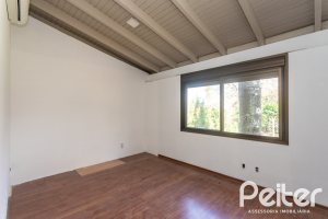 Casa em Condomínio à venda com 328m², 3 dormitórios, 2 suítes, 4 vagas, no bairro Cavalhada em PORTO ALEGRE