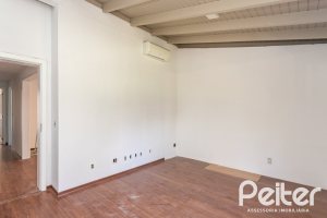 Casa em Condomínio à venda com 328m², 3 dormitórios, 2 suítes, 4 vagas, no bairro Cavalhada em PORTO ALEGRE