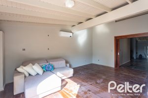 Casa em Condomínio à venda com 328m², 3 dormitórios, 2 suítes, 4 vagas, no bairro Cavalhada em PORTO ALEGRE