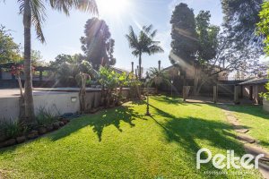 Casa em Condomínio à venda com 328m², 3 dormitórios, 2 suítes, 4 vagas, no bairro Cavalhada em PORTO ALEGRE
