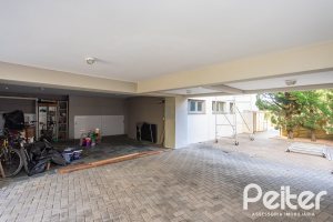Casa em Condomínio à venda com 328m², 3 dormitórios, 2 suítes, 4 vagas, no bairro Cavalhada em PORTO ALEGRE